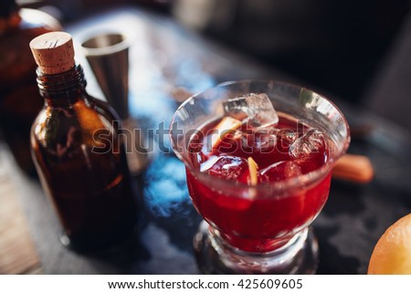 Close up shot of fresh negroni cocktail made from skilled bartenders
