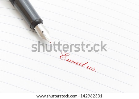ink pen and email us written in red on a lined paper