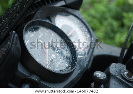 motor bike odometer fuel meter tachometer  with dew droplets