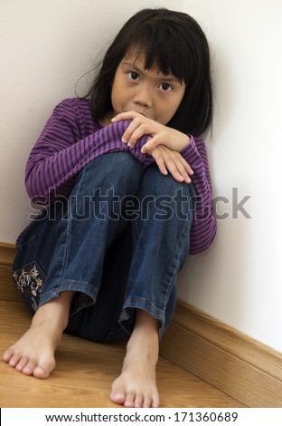 Alone little girl with sad emotion