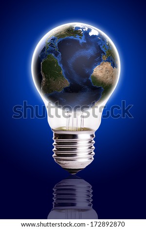 Bulb with globe blue black gradient background,Earth Map and Globe shape courtesy of NASA.