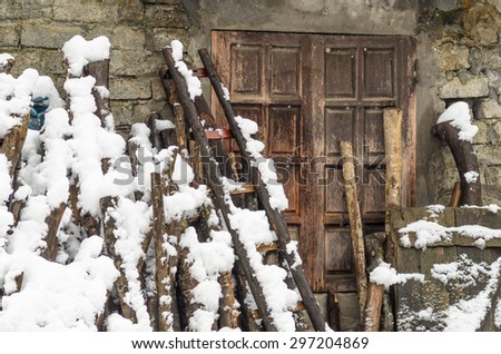 SA PA, VIETNAM at DECEMBER 2013: Poles is covered full snow outside the window of a minority in Sa pa.