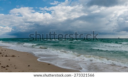 Ocean water surface under cloudy sky. Great impression of distance and solitude.
