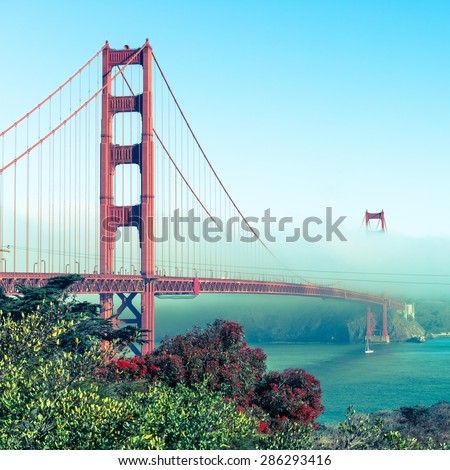 Famous Golden Gate Bridge. The bright blue sky. Coastline of California. Vintage filter