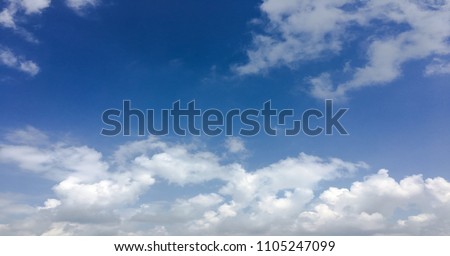 Beautiful clouds against a blue sky background. Cloud sky. Blue sky with cloudy weather, nature cloud. White clouds, blue sky and sun