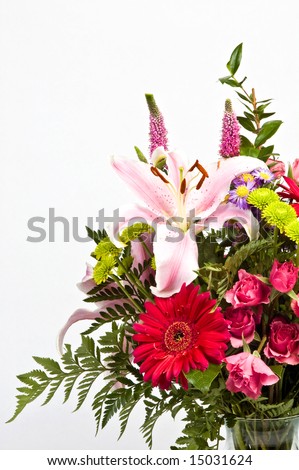 Lilly floral arrangement shot in the studio against white.