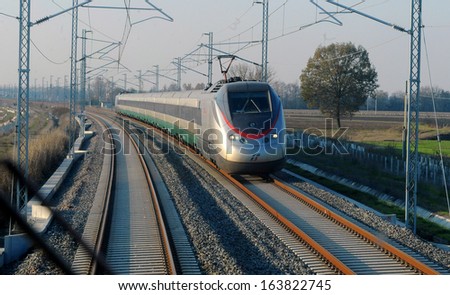 MILAN, ITALY - NOVEMBER 26: new high speed train Freccia Rossa connecting Milan central station to Bologna central station, November 26, 2007 in Milan, Italy.