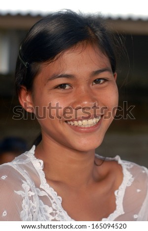 BALI, INDONESIA - FEBRUARY,14: portrait of a young balinese woman, on February,14, 2005 in Bali, Indonesia.