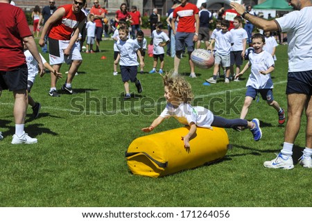 MILAN, ITALY - JUNE 02: Rugby school camp for children at the Arena in Milan June 02, 2013.