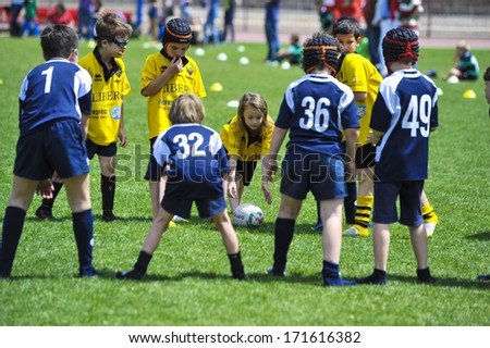 Milan, Italy - June 02: Children Playing Rugby During A School Camp At The Arena In Milan. June 02, 2013.