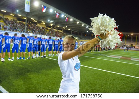 MILAN, ITALY - AUGUST 31: an italian cheerleader supporting the national team during the American Football European Championship match Italy vs Spain in Milan AUGUST 31, 2013.
