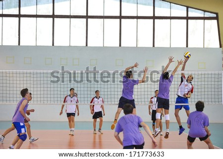 MILAN, ITALY - MAY 27: College male students competing during a volleyball school final in MilanMay 27 ,2013.