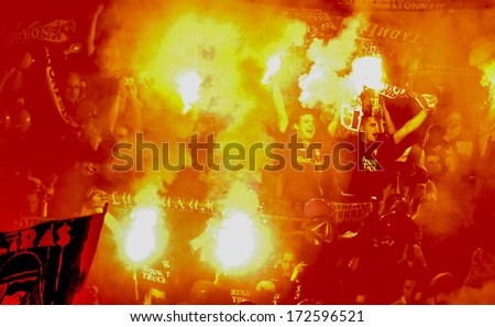 MILAN, ITALY - APRIL 06: Soccer fans fire smoke bombs at San Siro stadium in Milan April 06, 2006.
