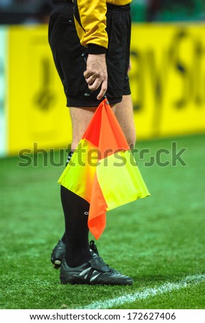 MILAN, ITALY - APRIL 06: Linesman flag of a referee assistant during a Champions League match at the San Siro stadium in Milan April 06, 2006.