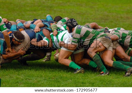 Parma, Italy - October 12: Rugby Players Pushing In A Scrum During The Italian Rugby League Match Parma Vs Treviso, In Parma, October 12, 2005.