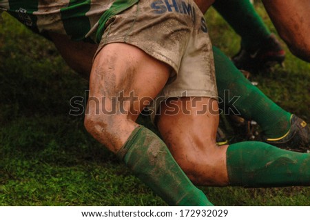 PARMA, ITALY - OCTOBER 12: Powerful close up legs pushing in a scrum, during an Italian professional Championship Rugby match Parma vs Treviso in Parma October 12, 2005.