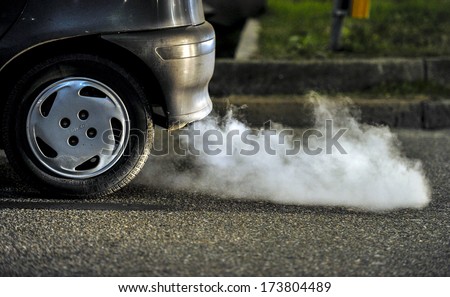 MILAN, ITALY - JANUARY 19: Close up of a car\'s fumes emissions in the traffic jam in Milan January 19, 2011.