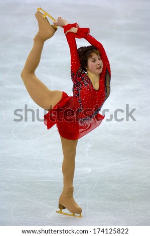 TURIN, ITALY - FEBRUARY 24, 2006: Irina Slutskaya (Russia) competing during the Winter Olympics Final of the female Figure Ice Skating.