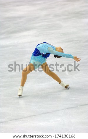 TURIN, ITALY- February 24, 2006: Arakawa Shizuka (Japan) competing during the Winter Olympics female Finale of Ice Figure Skating.