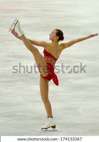 TURIN, ITALY - FEBRUARY 26, 2006: Kimmie Meissner (USA) performs during the Winter Olympics female\'s final of the Figure Ice Skating.
