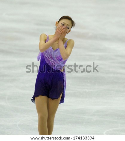 TURIN, ITALY - FEBRUARY 26, 2006: Suguri Fumie (Japan) touched at the end of the Winter Olympics female\'s final of the Figure Ice Skating.