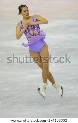 TURIN, ITALY - FEBRUARY 24, 2006: Lui Yan (China) performs during the Winter Olympics female\'s final of the Figure Ice Skating.