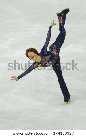 TURIN, ITALY - FEBRUARY 22, 2006: Irina Slutskaya (Russia) performs during the Winter Olympics female\'s competition of the Figure Ice Skating.
