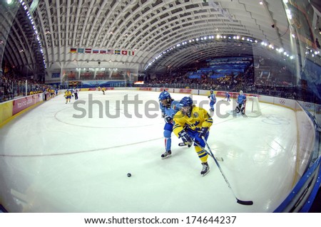 TURIN, ITALY-FEBRUARY 14, 2006: Panoramic view of the ice skating rink during the Female Ice Hockey match Italy vs Sweden, at the Winter Olympic Games of Turin 2006.