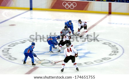 TURIN, ITALY-FEBRUARY 15, 2006: Male Ice Hockey match Italy vs Germany, at the Winter Olympic Games of Turin 2006.