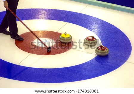 Turin, Italy-February 19, 2006: Close Up Of Curling Stones On Traget During The Winter Olympic Games Of Turin 2006.