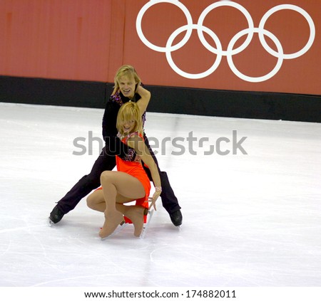 TURIN, ITALY-FEBRUARY 20, 2006: Albena Denkova and Maxim Staviski perform during the Couple Figure Ice Skating competion of the Winter Olympic Games of Turin 2006.
