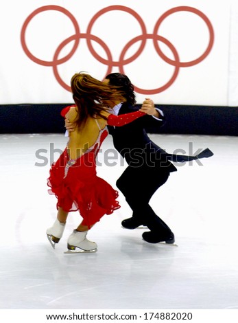 TURIN, ITALY-FEBRUARY 18, 2006: Federica Faiella and Massimo Scali perform during the Couple Figure Ice Skating competion of the Winter Olympic Games of Turin 2006.