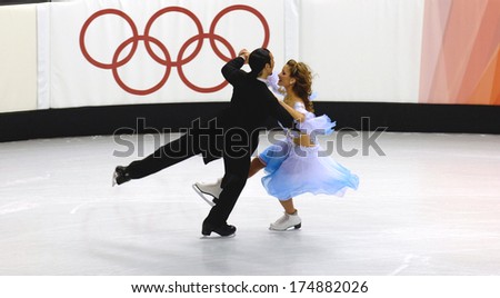 TURIN, ITALY-FEBRUARY 18, 2006: Tanith Belbin and Benjamin Agosto perform during the Couple Figure Ice Skating competion of the Winter Olympic Games of Turin 2006.