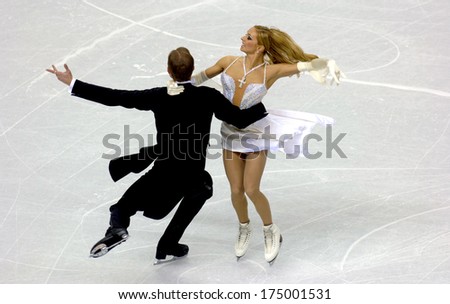 TURIN, ITALY-FEBRUARY 18, 2006: Tatiana Navka and Roman Kostomarov competing during the Couple Figure Ice Skating during the Winter Olympic Games of Turin 2006.