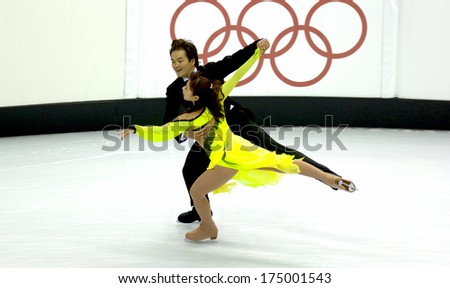 TURIN, ITALY-FEBRUARY 18, 2006: Nozomi Katanabe and Akiiuki Kido competing during the Couple Figure Ice Skating during the Winter Olympic Games of Turin 2006.