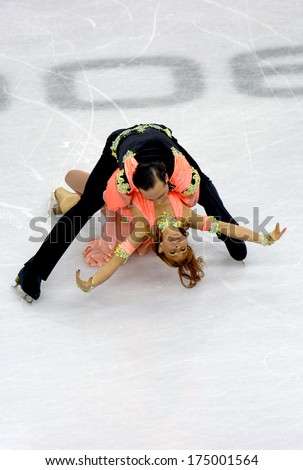 TURIN, ITALY-FEBRUARY 18, 2006: Barbara Fusar Poli and Maurizio Margaglio competing during the Couple Figure Ice Skating during the Winter Olympic Games of Turin 2006.
