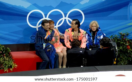 TURIN, ITALY-FEBRUARY 18, 2006: Barbara Fusar Poli and Maurizio Margaglio waiting for the result during the Couple Figure Ice Skating during the Winter Olympic Games of Turin 2006.