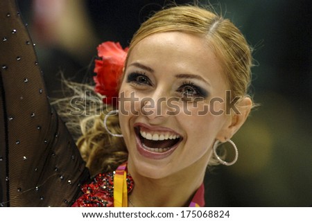 TURIN, ITALY-FEBRUARY 21, 2006: Tatiana Navka at the medals ceremonyof the Couple Figure Ice Skating\'s final during the Winter Olympic Games of Turin 2006.