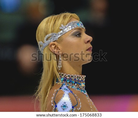 TURIN, ITALY-FEBRUARY 21, 2006: Elena Grushina before competing on the Couple Figure Ice Skating\'s final during the Winter Olympic Games of Turin 2006.