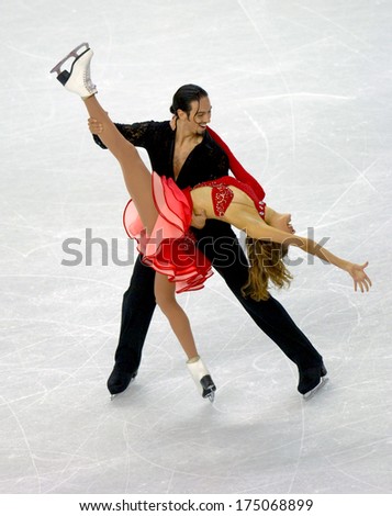 TURIN, ITALY-FEBRUARY 20, 2006: Tanith Belbin and Benjamin Agosto competing  on the Couple Figure Ice Skating competition during the Winter Olympic Games of Turin 2006.