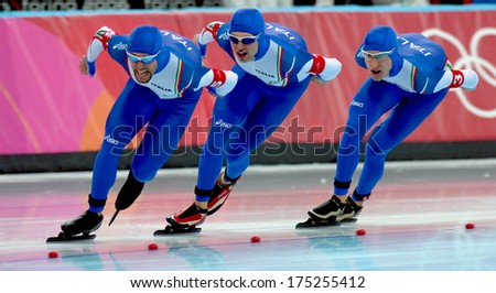 Turin, Italy February 17, 2006: Italian Team Competing During The Speed Ice Skating Competition During The Winter Olympic Games Of Turin 2006.