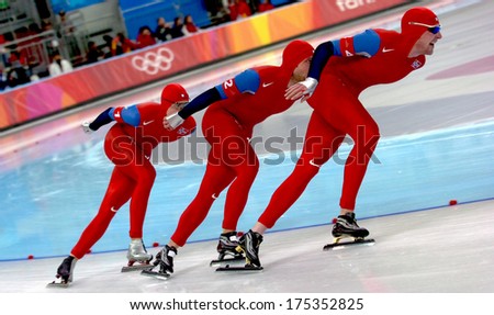 Turin, Italy-February 17, 2006: Norway Team Competing During The Speed Ice Skating Competition Of The Winter Olympic Games Of Turin 2006.