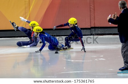 Turin, Italy February 16, 2006: Athletes Group Fall During The Short Track Competition At The Winter Olympic Games Of Turin 2006.