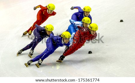 Turin, Italy February 08, 2006: Athletes Group During The Short Track Competition At The Winter Olympic Games Of Turin 2006.