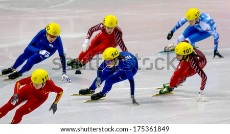 TURIN, ITALY FEBRUARY 23, 2006: Athletes group during the Short Track competition at the Winter Olympic Games of Turin 2006.
