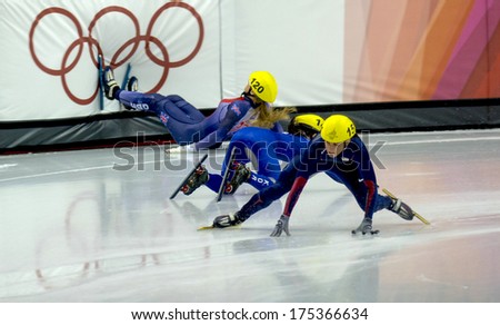 TURIN, ITALY FEBRUARY 196 2006: Athletes group during the Short Track competition at the Winter Olympic Games of Turin 2006.