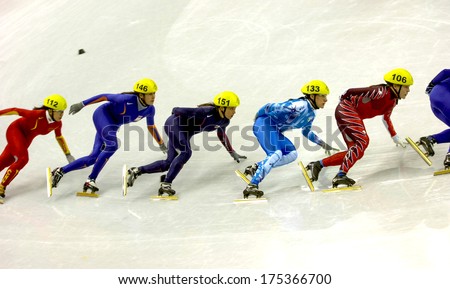 Turin, Italy February 19, 2006: Athletes Group During The Short Track Competition At The Winter Olympic Games Of Turin 2006.