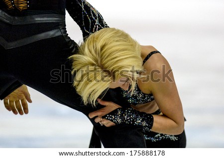 TURIN, ITALY-FEBRUARY 21, 2006: Close up couple dancing on the Figure Ice Skating competition, at the Winter Olympic Games of Turin 2006.