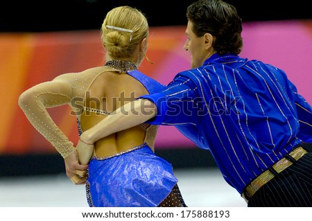 TURIN, ITALY-FEBRUARY 21, 2006: Couple ice dancing while competing on the Figure Ice Skating competition, at the Winter Olympic Games of Turin 2006.