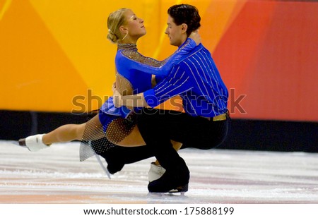 TURIN, ITALY-FEBRUARY 21, 2006: Couple ice dancing while competing on the Figure Ice Skating competition, at the Winter Olympic Games of Turin 2006.